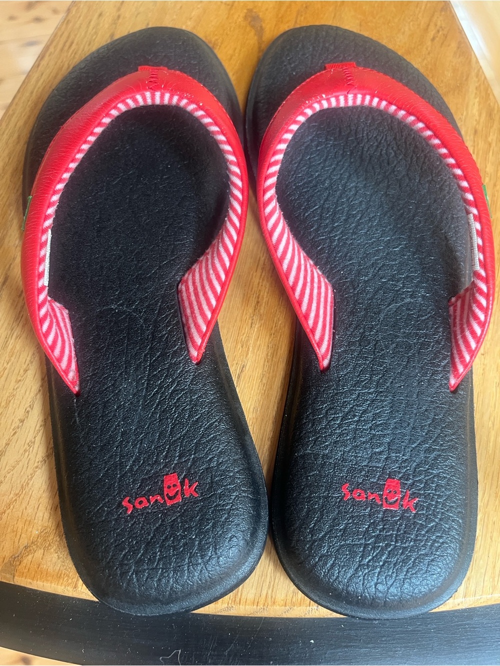 Sanuk Women's Black Footbed Sandals with Red Straps